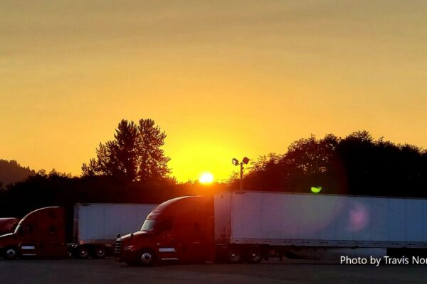 Sunset over truck yard-Travis Norris